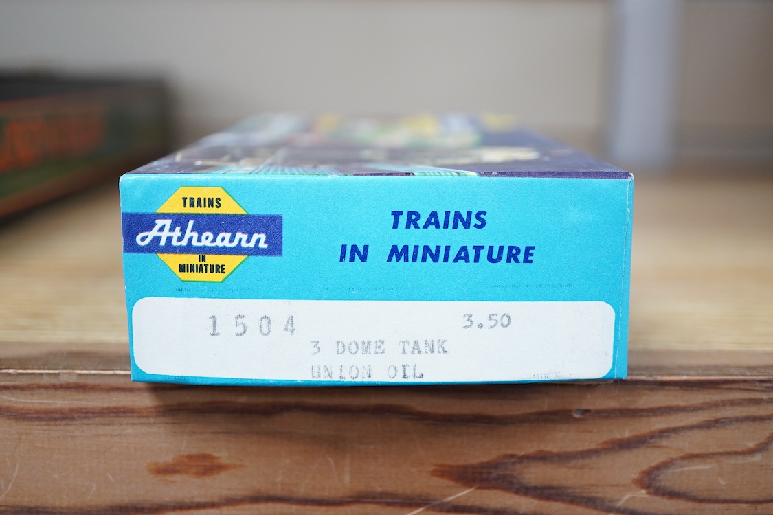 A quantity of US outline HO railway by Athearn, Bachmann, etc. including three locomotives; a Union Pacific Bo-Bo diesel, 1468, a Santa Fe Bo-Bo diesel, 5707, and a Santa Fe 0-4-0 tender engine, together with a 12-wheel